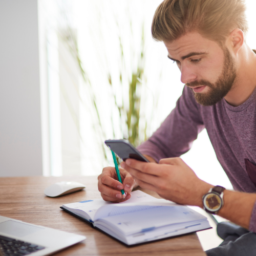 Man with calendar and laptop